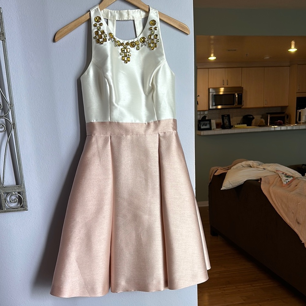 Elegant White and Pink Sleeveless Dress with Gold Embellishments